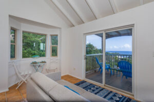 Beautiful living area with windows and chairs